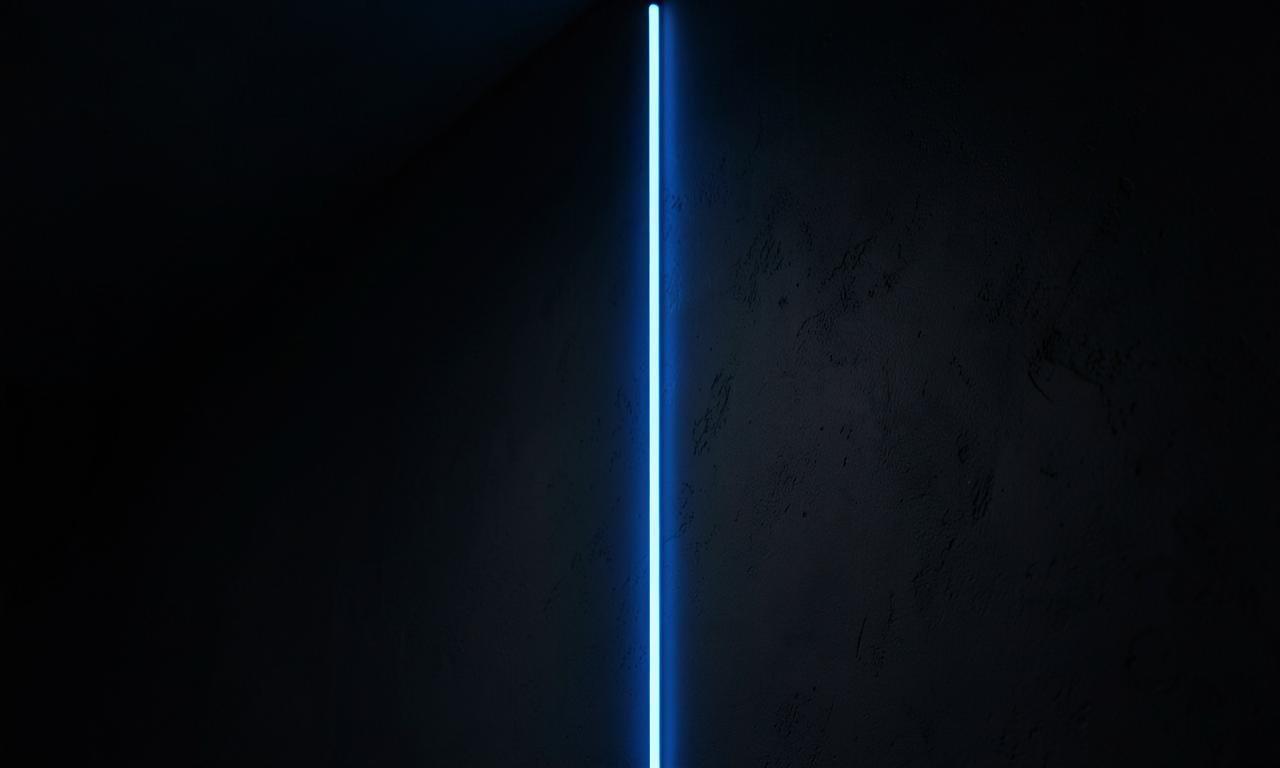 A single line of cobalt light cutting through a dark architectural surface